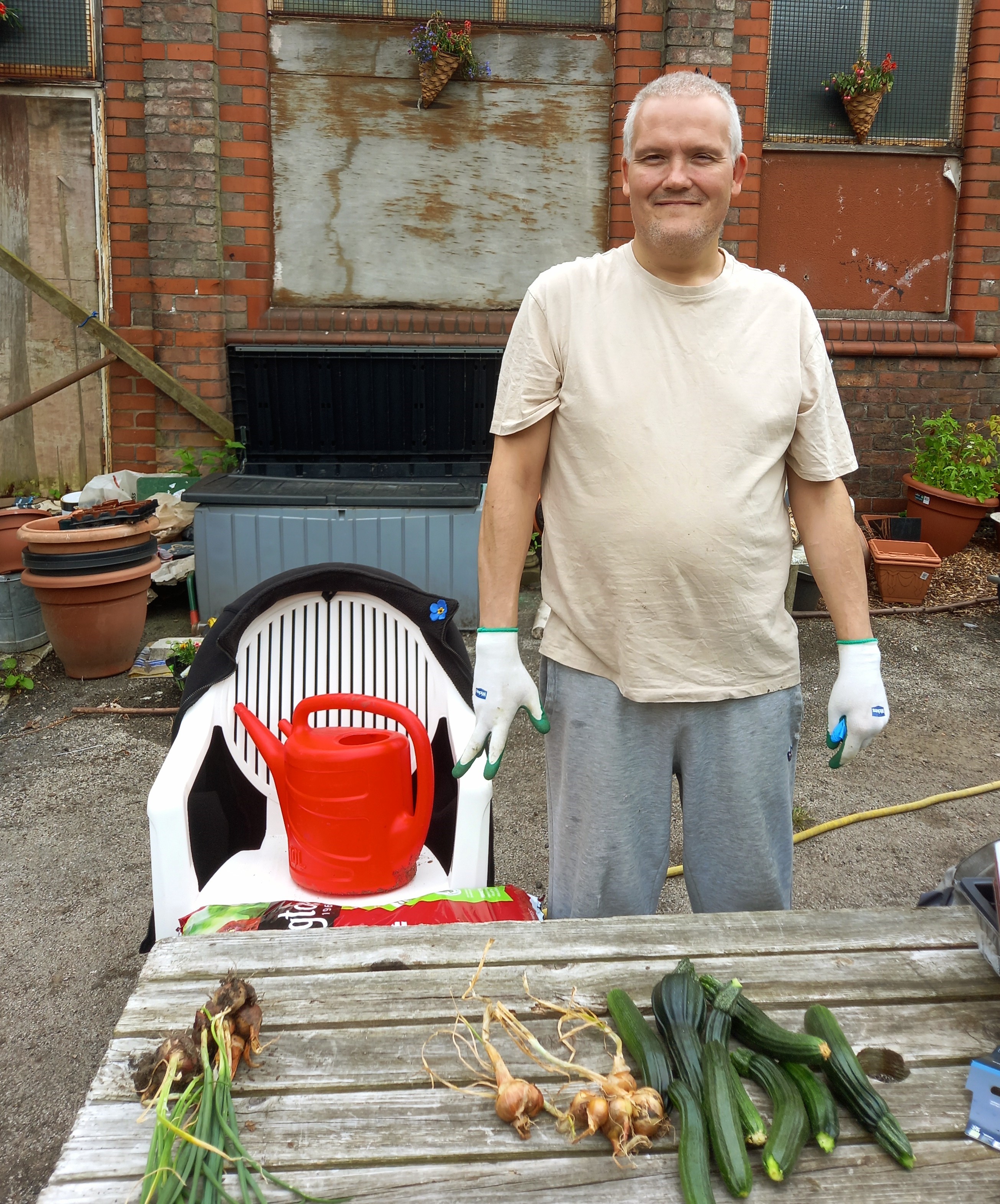 Volunteer with some veg from the garden