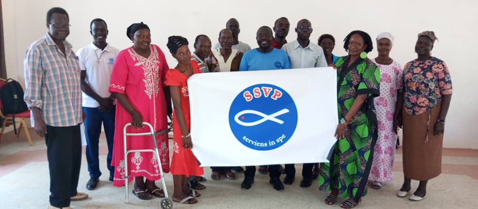 South Sudan conference with banner