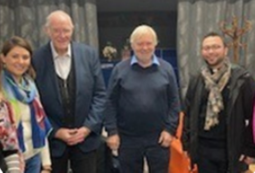 Chair of Deaf Centre with a group.