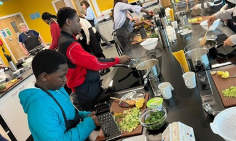 Youth group doing a cooking lessons