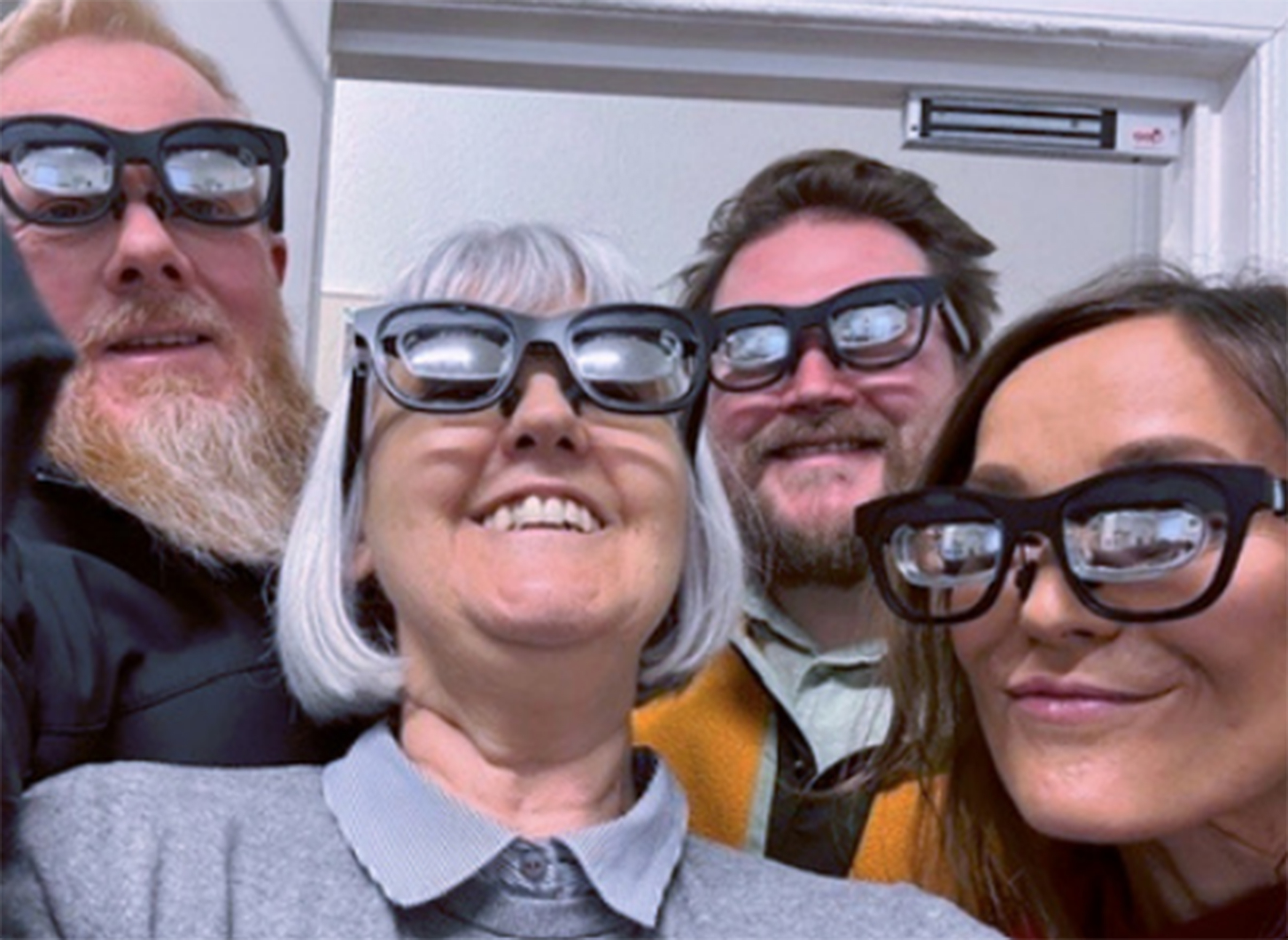 Volunteers wearing smart glasses