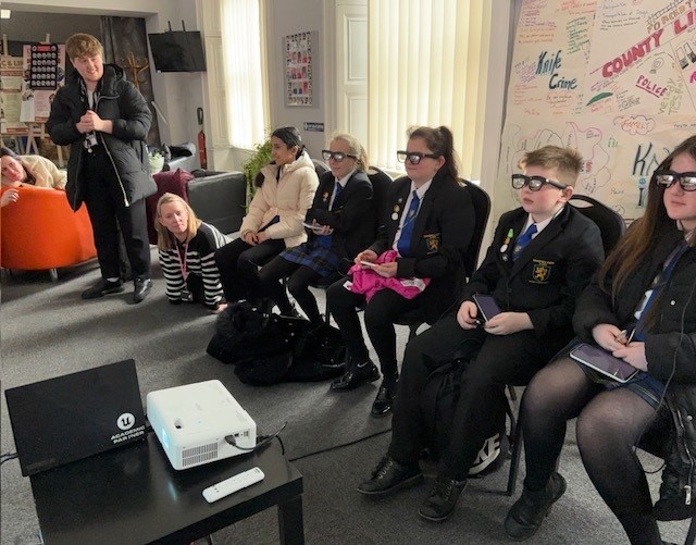 Students wearing VR glasses