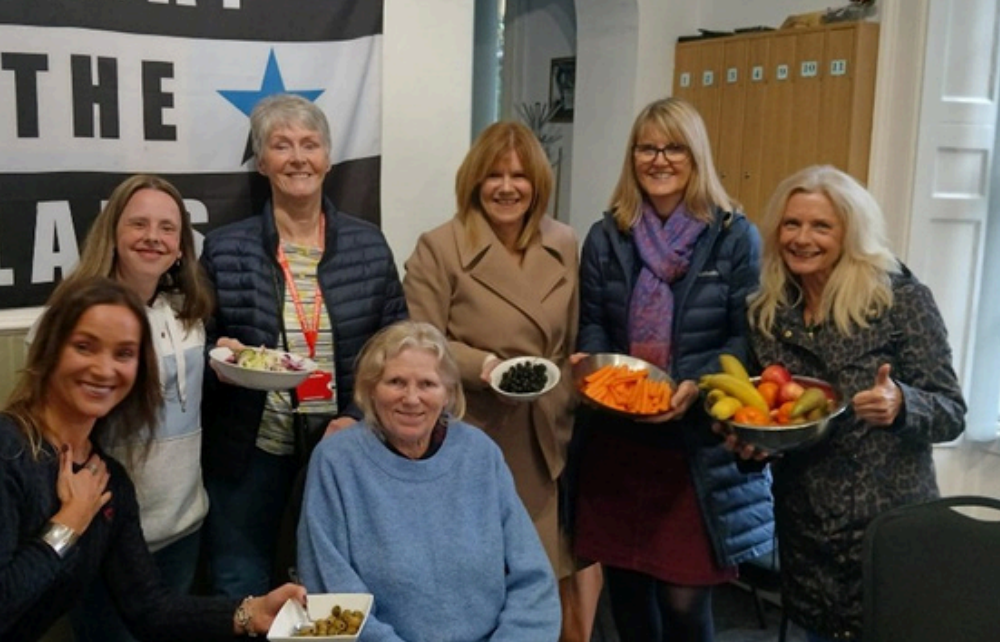 Deaf centre ladies with food