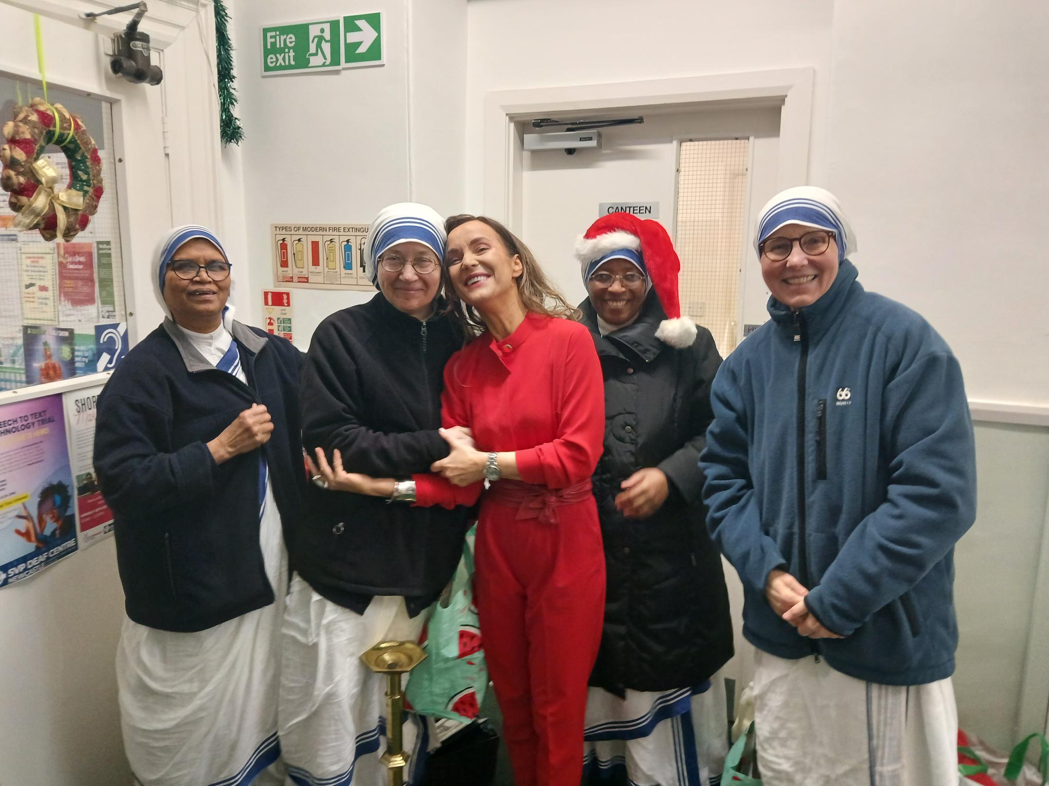 Head of deaf centre (2024) with Missionaries of Charity Sisters.