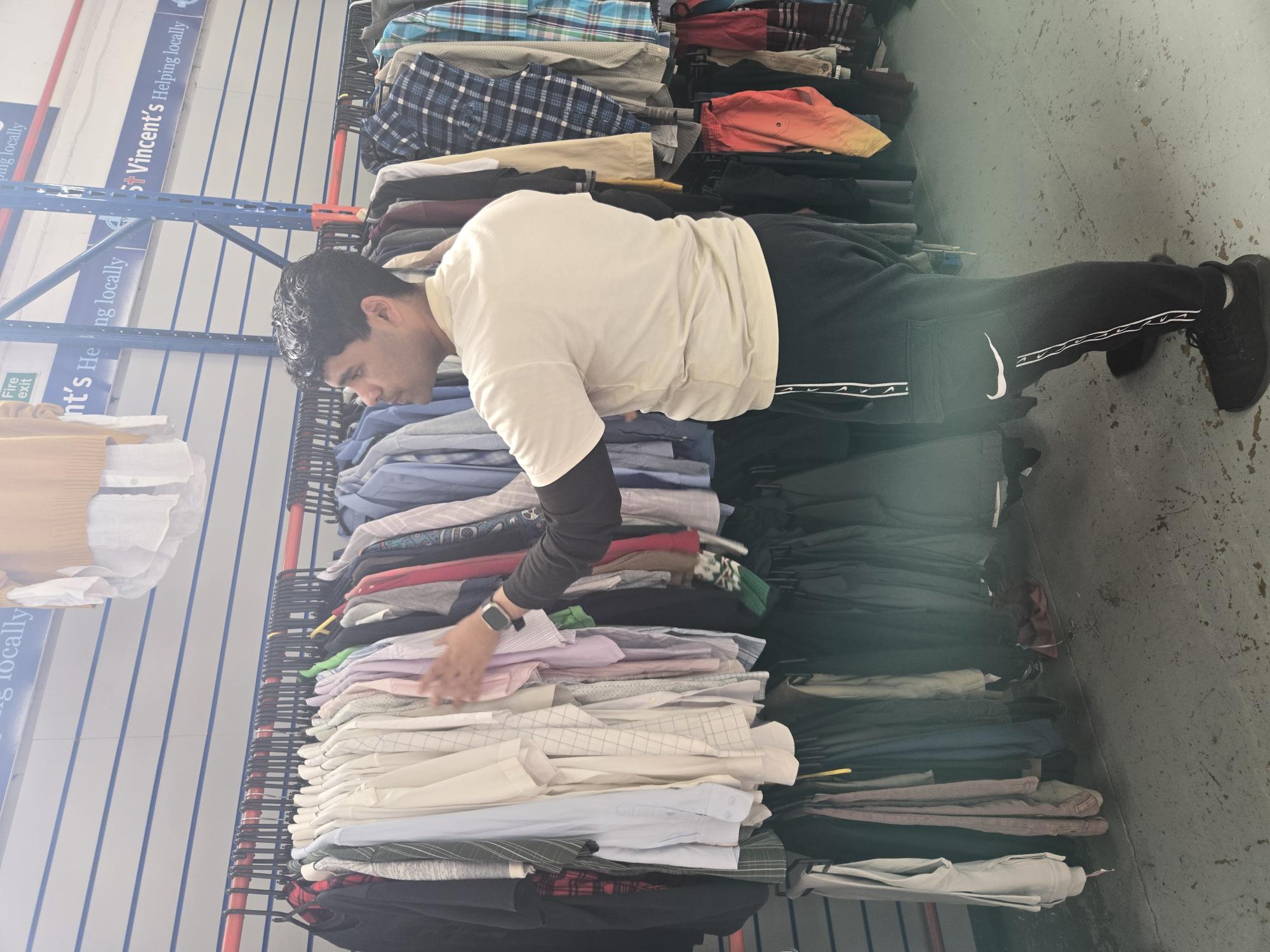 volunteer sorting clothes