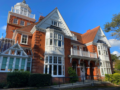 Beautiful red brick and white detached property called Tower House in Brighton